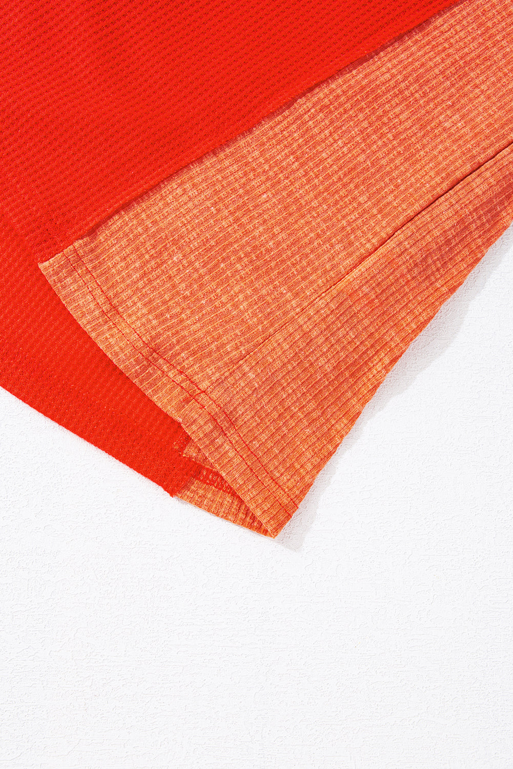 Red Studded V Neckline Exposed Seam Textured Knit Top