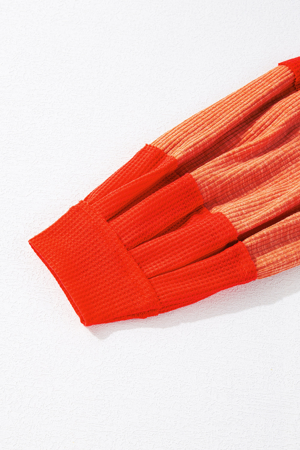 Red Studded V Neckline Exposed Seam Textured Knit Top